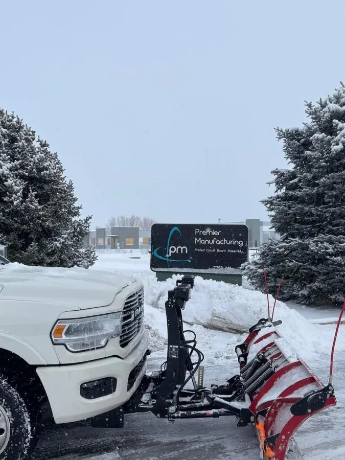 Plow truck on site at a commercial facility